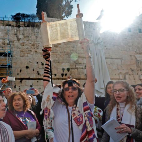 A photo of a large group of women protesting at the Western Wall