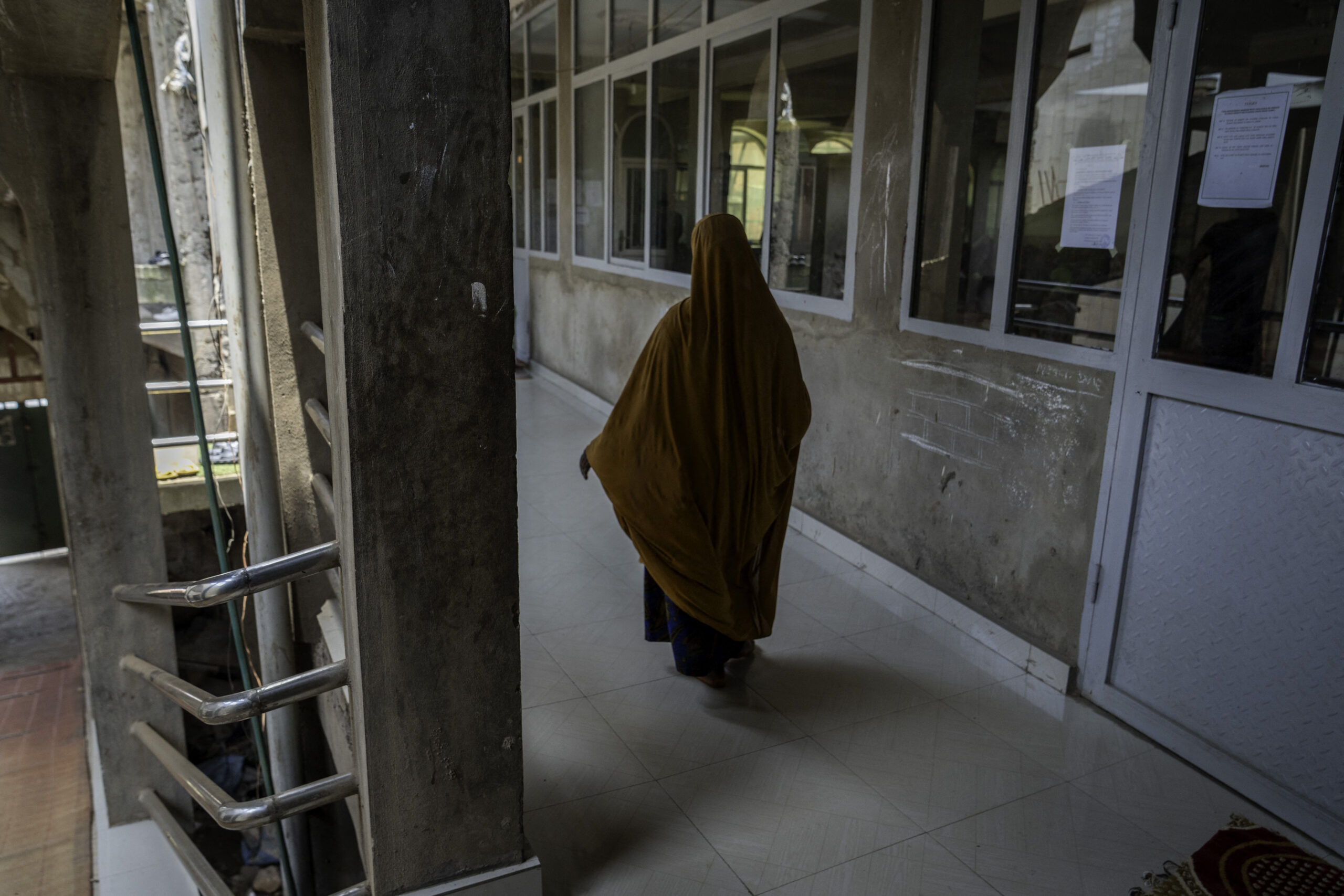 A Muslim woman enters the Nyawera mosque during the Muslim holy fasting month of Ramadan, in Bukavu, South Kivu province, eastern Democratic Republic of Congo, on March 3, 2025. Members of the Muslim community in Bukavu are disrupting their prayer schedule at the start of the month of Ramadan over security measures. The city is under the control of the Rwandan-backed M23 armed group. (Photo by Glody MURHABAZI / AFP) (Photo by GLODY MURHABAZI/AFP via Getty Images)